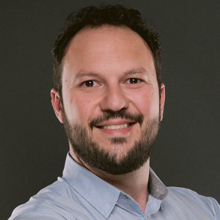 Porträtfoto von Gus Marcondes, Global Training Manager bei NETGEAR Enterprise