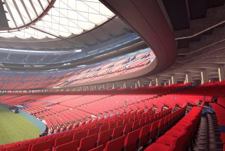 Kurve im Spotify Camp Nou ohne Zuschauer mit roten Sitzen